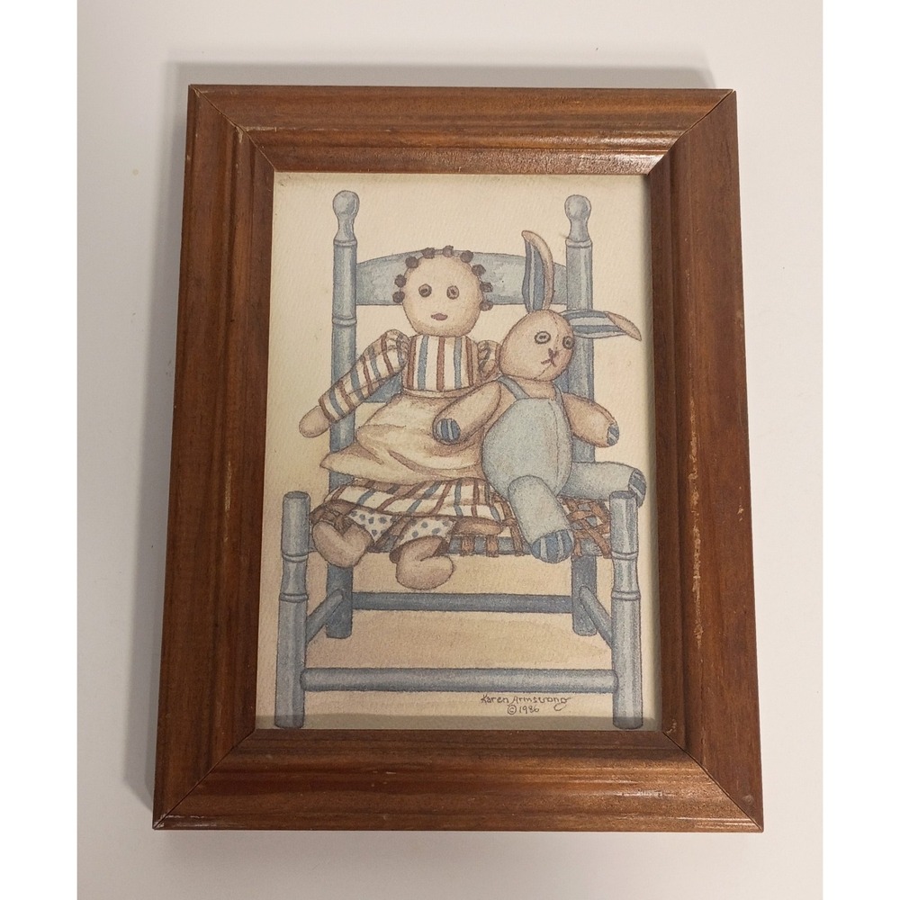 Karen Armstrong 1986 Dolls on a Chair Matted and Framed Print 17 cm x 22 cm